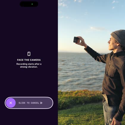 Vloggie showing “Face the camera” while a vlogger holds their phone at arm’s length by the sea.