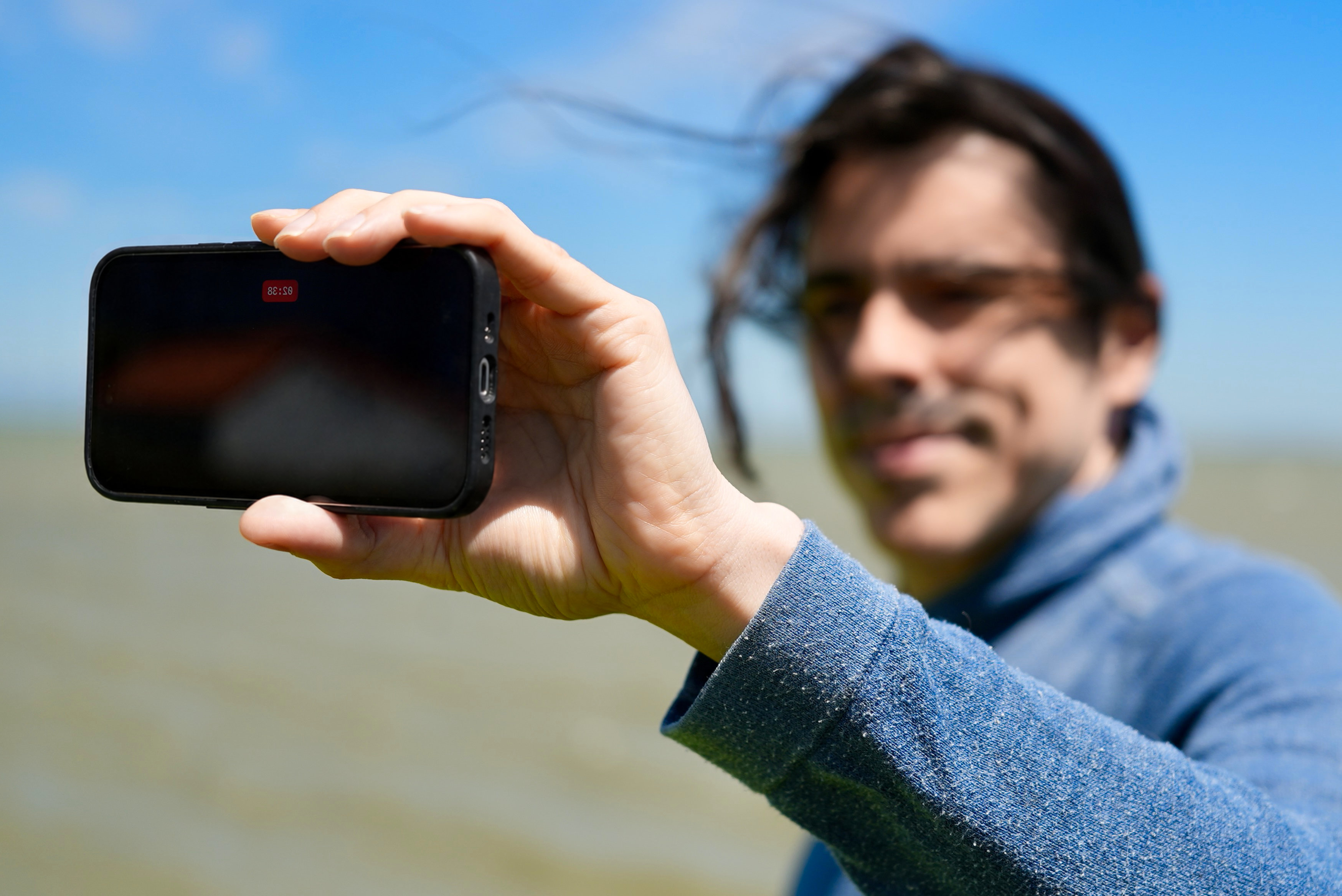 A man vlogging with Vloggie.